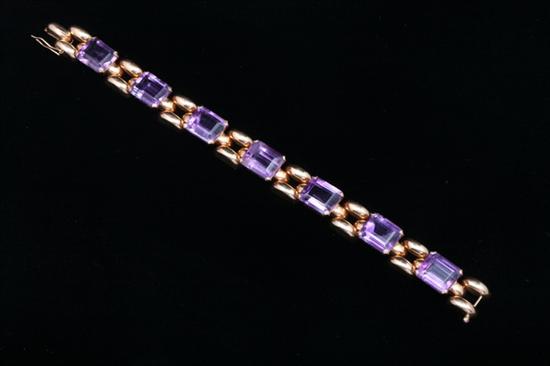 Appraisal: K YELLOW GOLD AND AMETHYST RETRO DESIGN BRACELET Seven rectangular