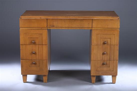 Appraisal: CONTINENTAL ART DECO FRUITWOOD DOUBLE-PEDESTAL DESK Rectangular top over three