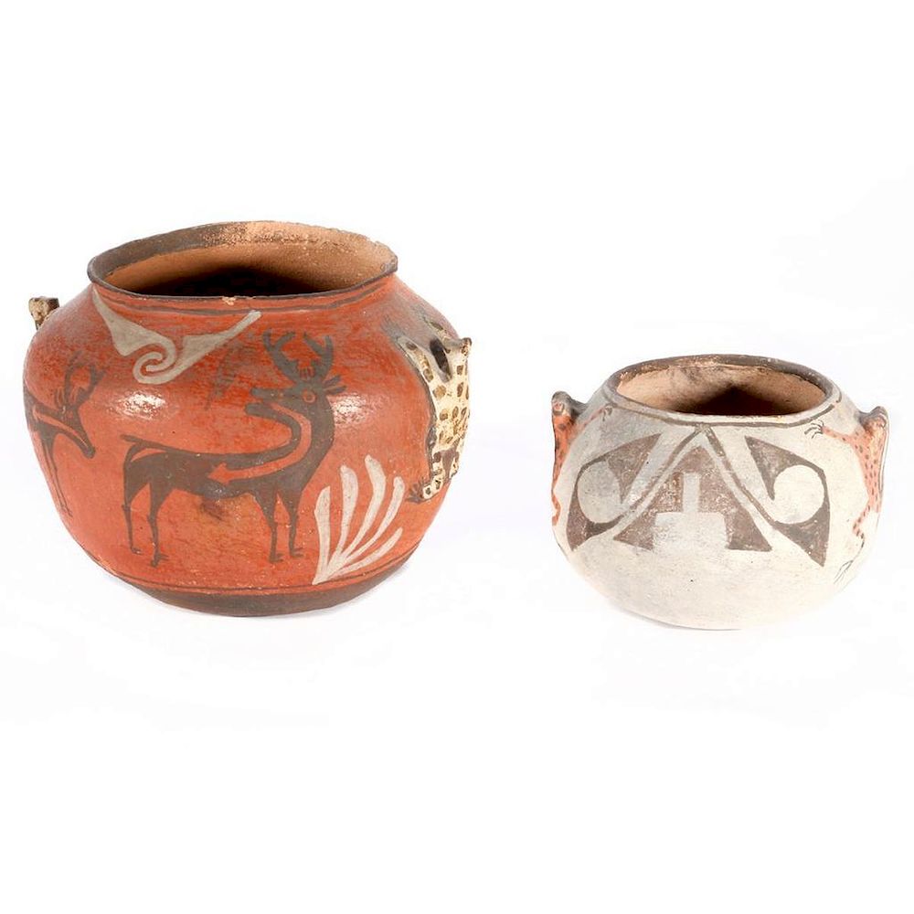 Appraisal: Two Zuni Polychrome Frog Jars Each with two frogs Diameter