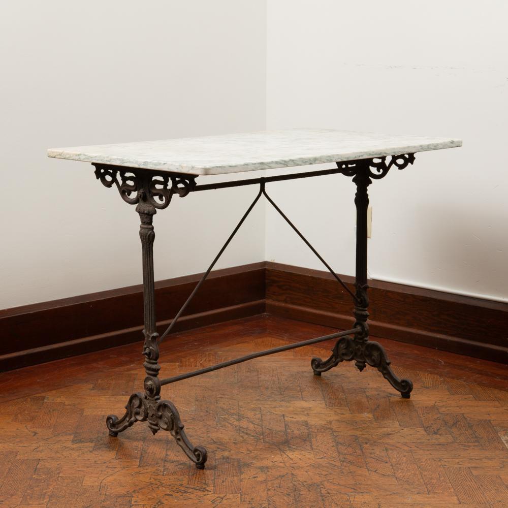 Appraisal: ANTIQUE IRON GARDEN TABLE WITH MARBLE TOP An early th