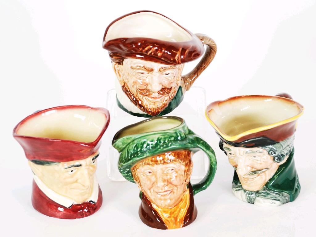 Appraisal: FOUR SMALL ROYAL DOULTON POTTERY CHARACTER JUGS 'Drake' 'Cardinal' 'Dick