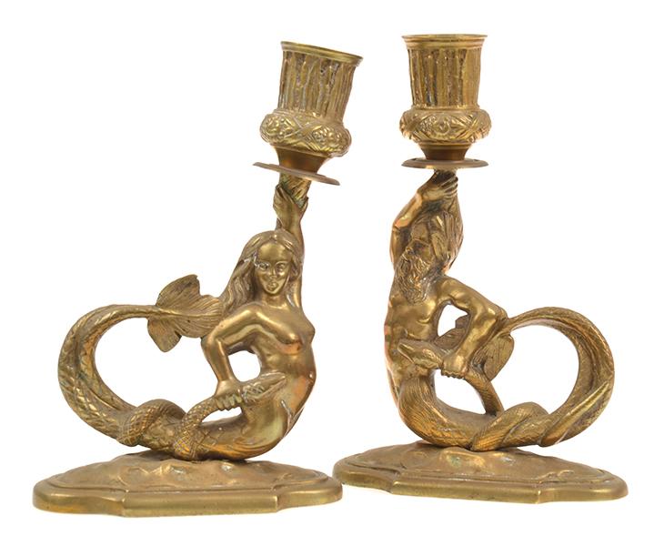 Appraisal: A PAIR OF GILT METAL MYTHOLOGICAL CANDLESTICKS FAULTS