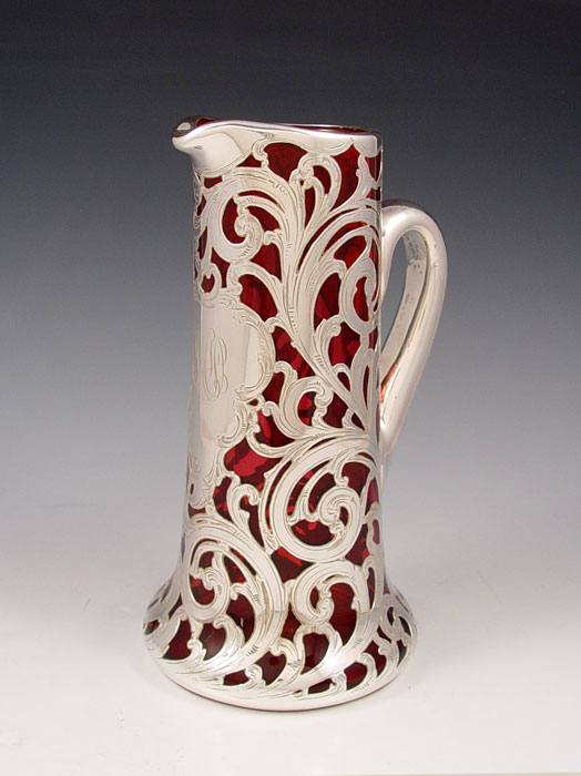 Appraisal: ALVIN STERLING SILVER OVERLAY CRANBERRY GLASS PITCHER fine silver overlay