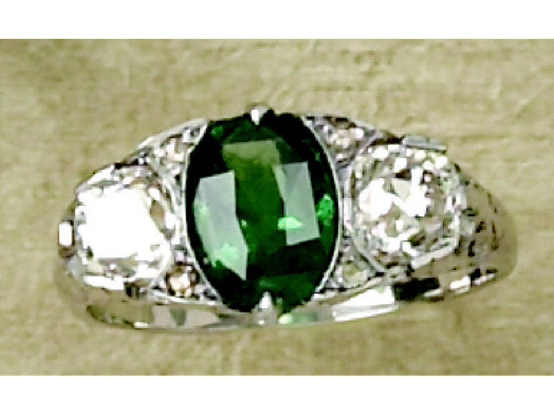 Appraisal: TSAVORITE AND DIAMOND RING k white gold ring set with