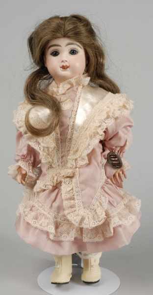 Appraisal: French Bisque Mechanical Roullet D camps Doll Description Unusual model