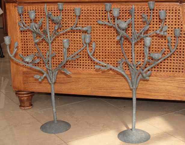 Appraisal: A PAIR OF METAL EIGHT LIGHT CANDELABRA in the form