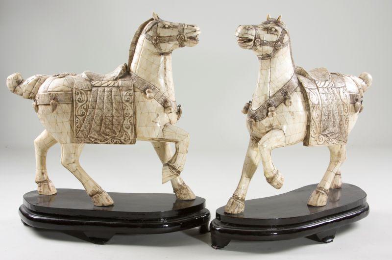 Appraisal: Pair of Asian Equestrian Statues made of triangular carved bone