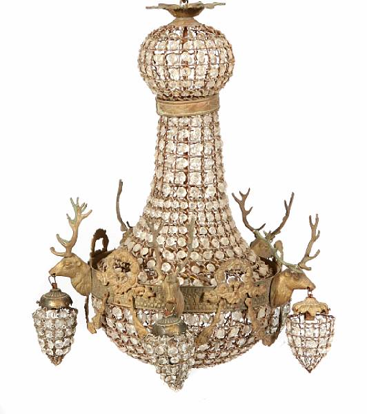 Appraisal: A Neoclassical style bronze and crystal chandelier with figural deer