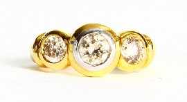 Appraisal: An ct gold three stone round brilliant cut diamond ring