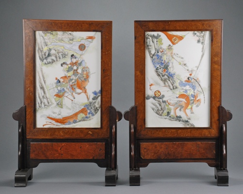 Appraisal: A matched pair of porcelain plaques enameled with courtesans on