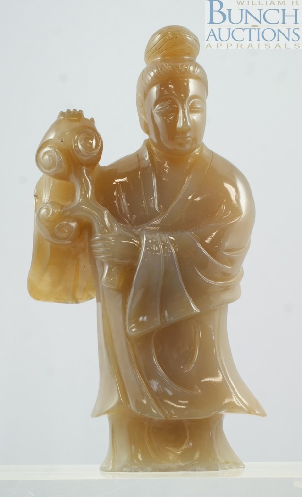 Appraisal: Chinese carved hardstone quanyin measuring high Roughness to bottom edge