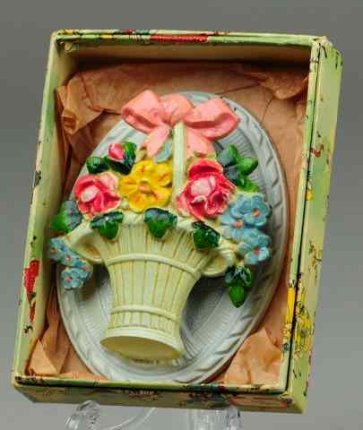 Appraisal: FRENCH BASKET DOORKNOCKER Hubley boxed example No cast iron colorfully