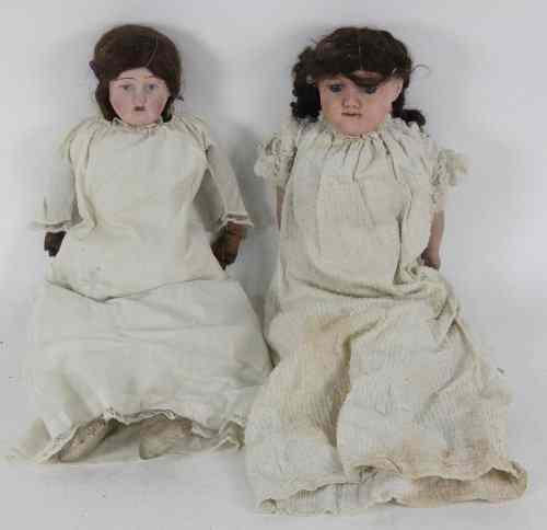 Appraisal: A bisque head doll with painted eyes and mouth the