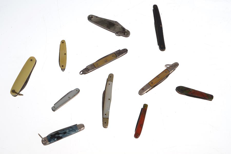 Appraisal: A GROUP OF ELEVEN COLLECTIBLE MINIATURE POCKET KNIVES including six