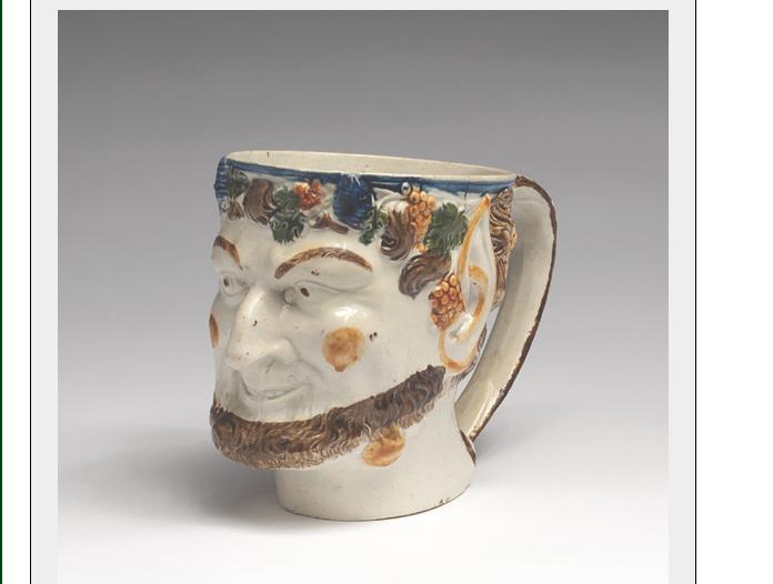 Appraisal: STAFFORDSHIRE PEARLWARE SATYR'S MASK MUG - Height inches Est -