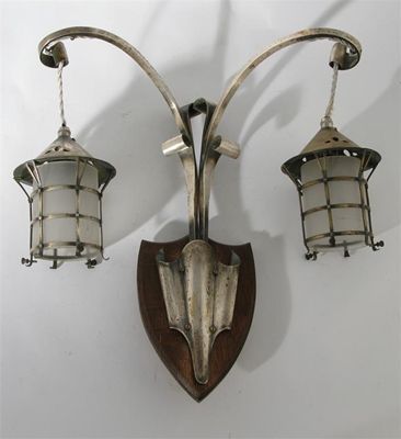 Appraisal: Three twin-branch chromed metal wall lights with frosted glass shades