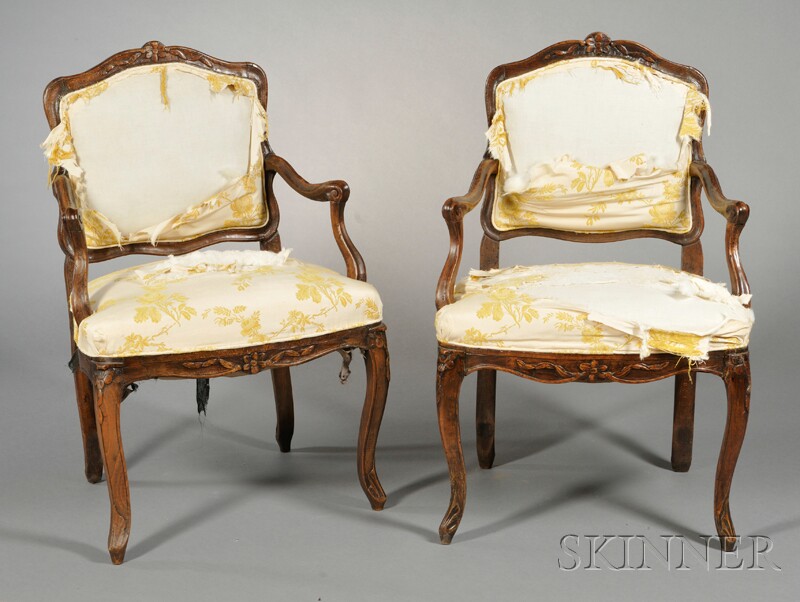 Appraisal: Pair of Provincial Fauteuils France late th century cartouche-shaped back