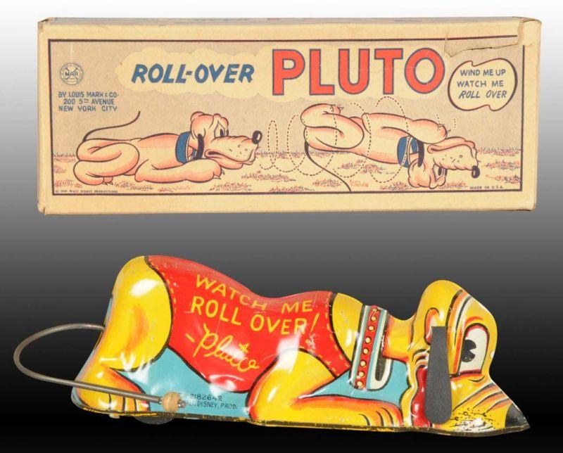 Appraisal: Walt Disney Marx Roll-over Pluto Toy Description Includes original box