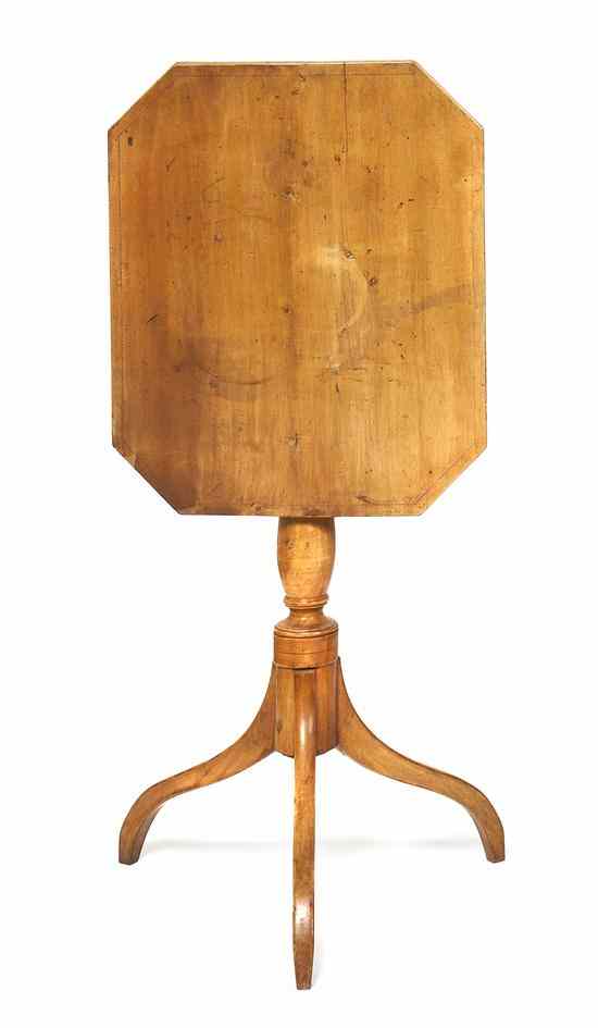 Appraisal: An American Cherry Tilt-Top Tea Table the rectangular tilt-top having