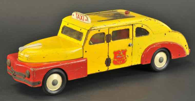 Appraisal: BUDDY 'L' TAXI Wooden example from the wooden years done