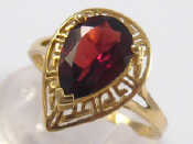 Appraisal: A yellow metal tests carat gold garnet ring size P