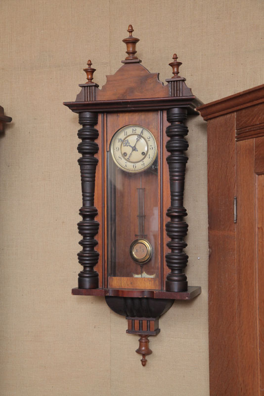 Appraisal: HANGING WALL CLOCK Unattributed Eight day time strike with brass