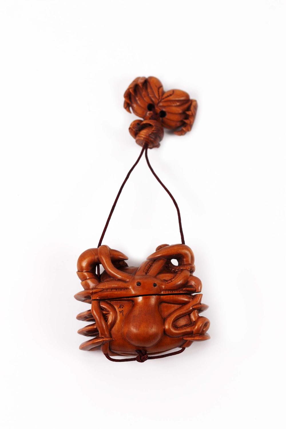 Appraisal: JAPANESE CARVED WOOD CRAB-FORM INROSigned Height in Width in