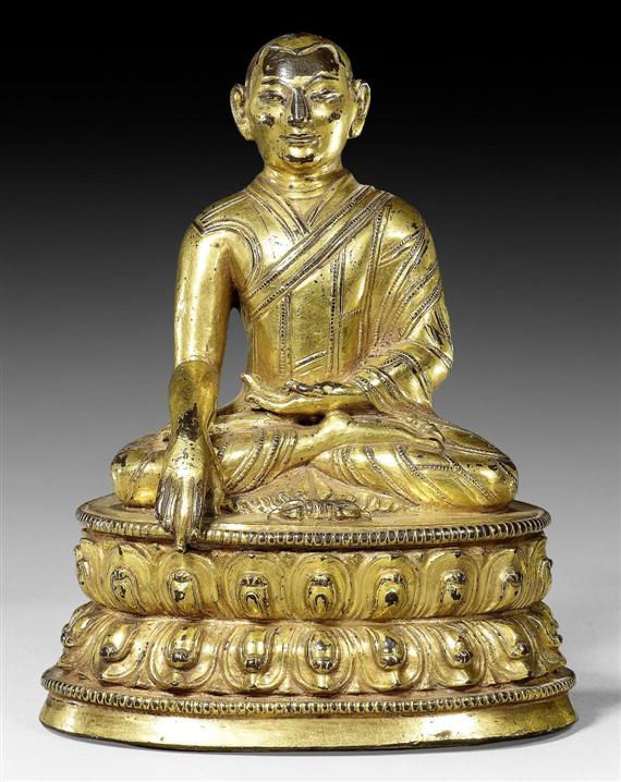 Appraisal: A GILT BRONZE FIGURE OF A HIGH RANKING LAMA Tibet