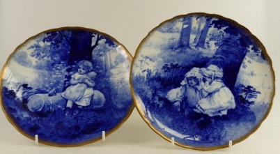 Appraisal: Royal Doulton pair blue children plates one decorated with girl