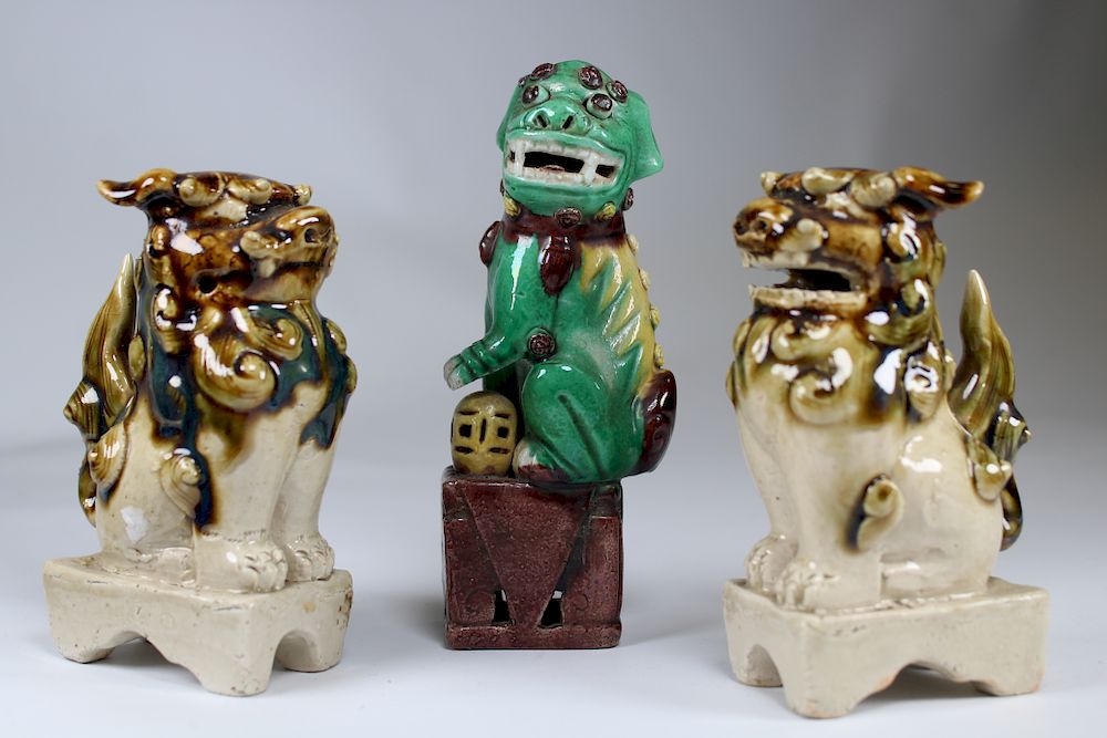 Appraisal: Chinese Glazed Terracotta Foo Dogs Chinese Glazed Terracotta Foo Dogs