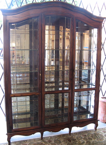 Appraisal: LARGE OAK BEVELED AND LEADED GLASS DISPLAY CABINET Pulaski Furniture