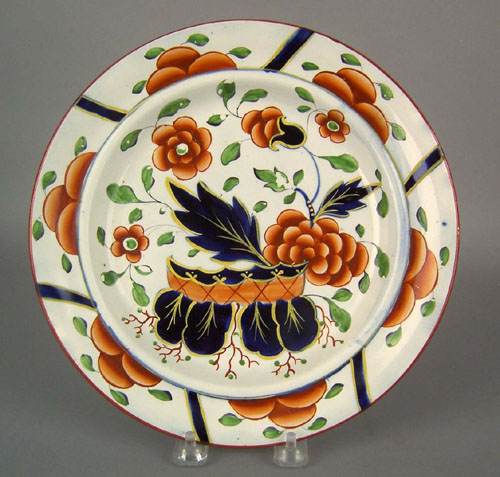 Appraisal: Gaudy Dutch plate th c in the war bonnet pattern