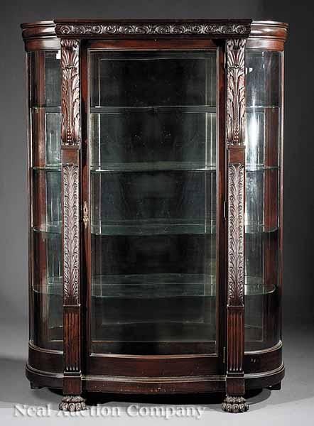 Appraisal: An American Carved Mahogany China Cabinet c foliate carved crest