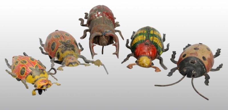 Appraisal: Lot of Tin Beetle Wind-Up Toys Description German Working A