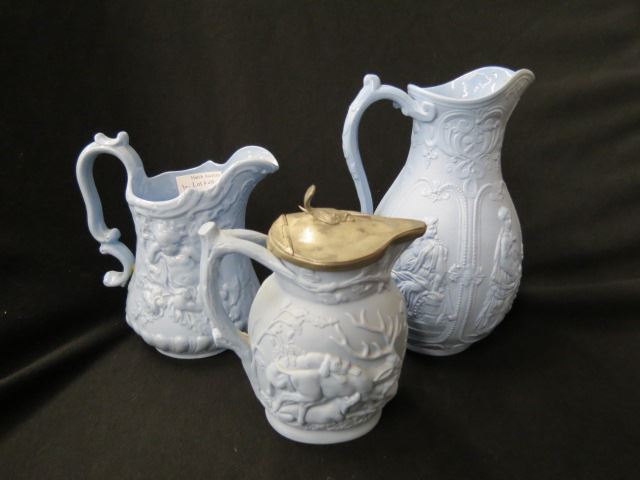 Appraisal: English Relief Pitchers blue mid th century with pewter lid