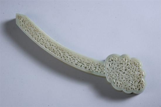 Appraisal: CHINESE CELADON JADE RUYI SCEPTER-FORM POMANDER Qing Dynasty Cover carved