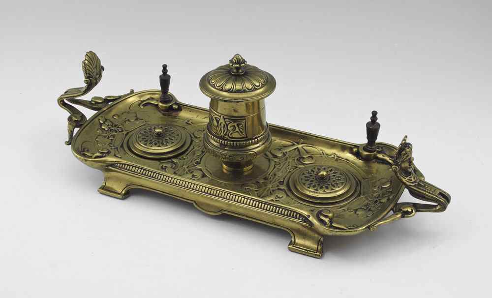 Appraisal: ART NOUVEAU BRASS INKSTAND Cast brass with single well with