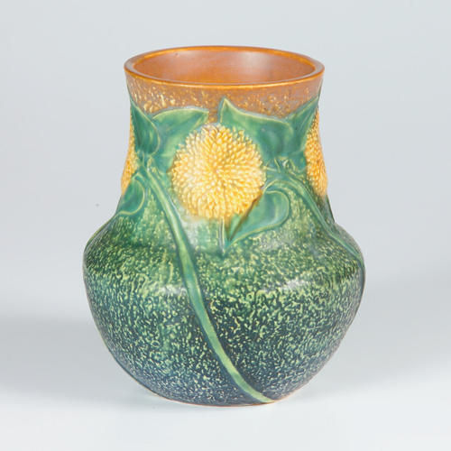 Appraisal: ROSEVILLE Sunflower vase Strong mold and color Restoration to small