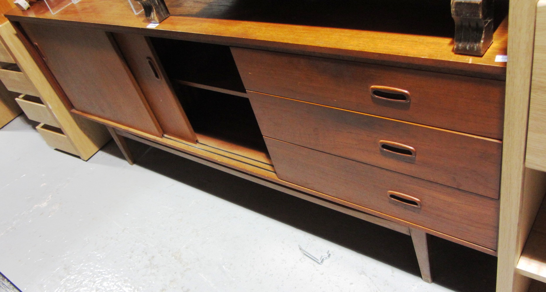 Appraisal: A th century Danish teak sideboard