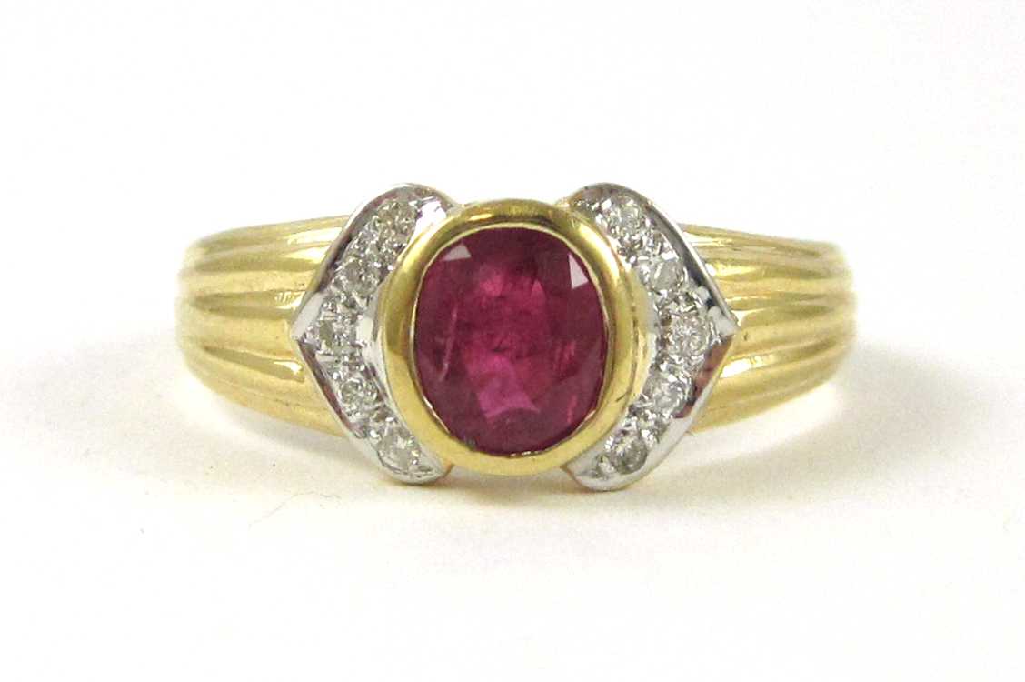 Appraisal: RUBY DIAMOND AND FOURTEEN KARAT GOLD RING with five round-cut