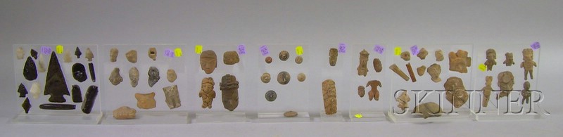 Appraisal: Eight Plexiglas Frames of Miscellaneous Pre-Columbian Items including early Mexican