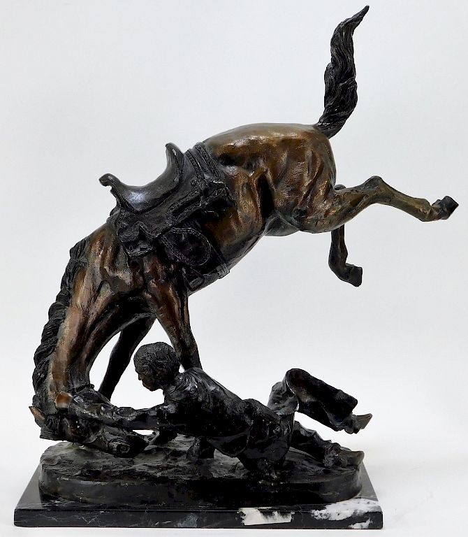 Appraisal: Kevin William Fallen Cowboy Bronze Statue United States th Century