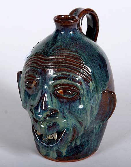 Appraisal: Outsider Art Charlie West Face Jug West Charlie Face Jug