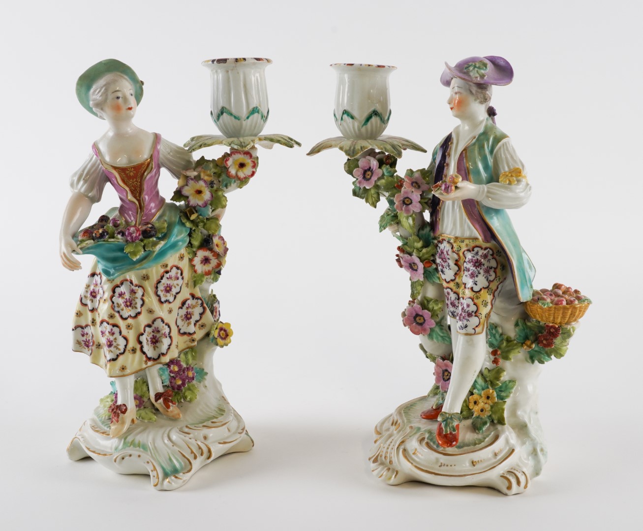 Appraisal: A PAIR OF DERBY CANDLESTICK FIGURES Circa Modelled as a