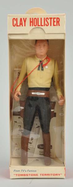 Appraisal: Hartland Clay Hollister Plastic Gunfighter Figure Include crisp original box