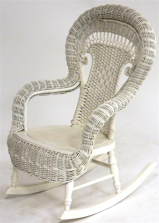 Appraisal: Child's wicker rocking chair painted white loose strands surface wear