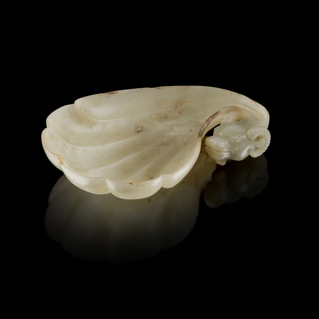 Appraisal: INSCRIBED GREY JADE SCALLOPED 'RAM' LIBATION CUP the scalloped cup