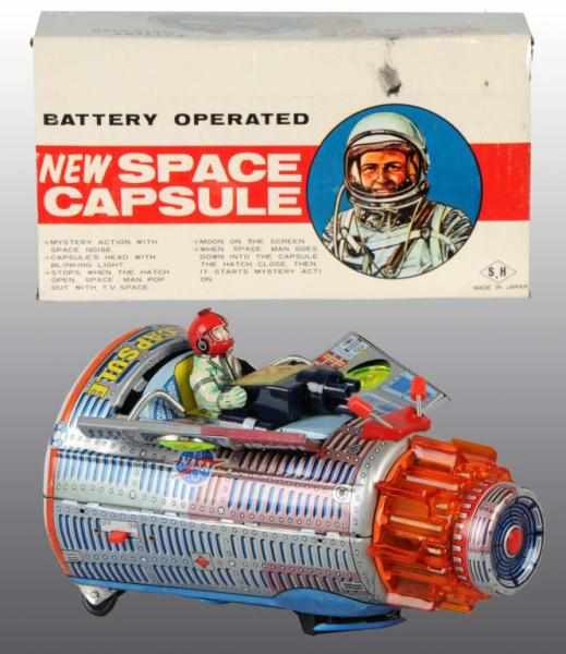 Appraisal: Tin New Space Capsule Battery-Operated Toy Description Japanese Working When