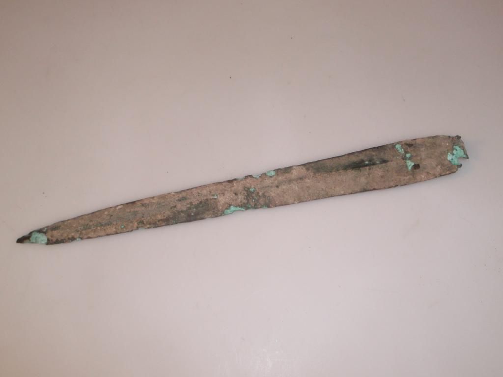 Appraisal: A Near Eastern cast bronze spear with a raised central