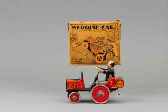 Appraisal: WHOOPIE CAR WITH PARTIAL BOX Louis Marx lithographed tin suited